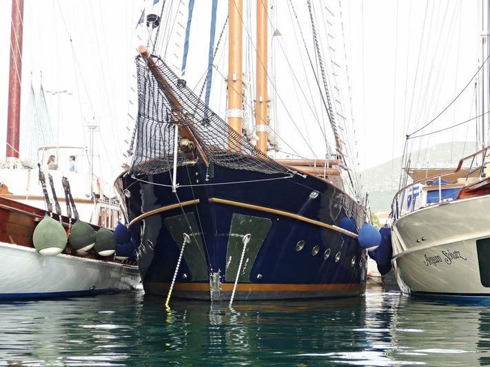 a boat is parked in the water aboard BLUE DREAM Yacht for Sale