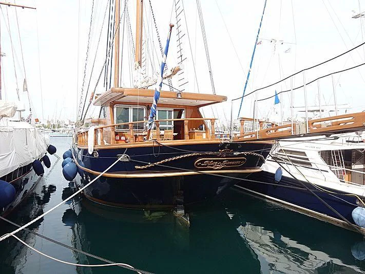 a group of boats are parked in a harbor aboard BLUE DREAM Yacht for Sale