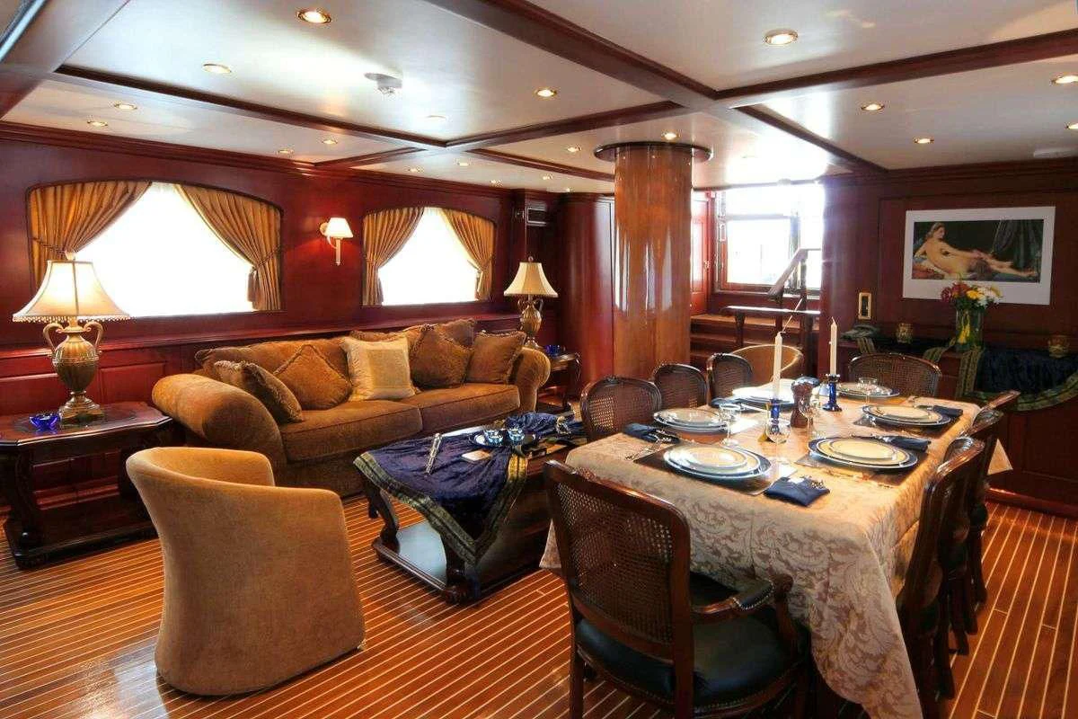 a dining room with a large table aboard BLUE DREAM Yacht for Sale