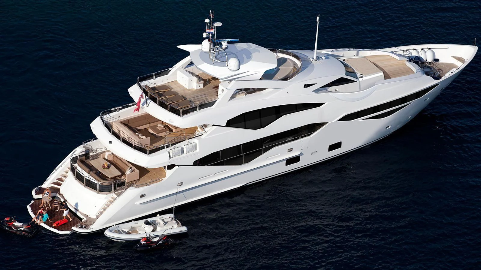a white yacht on the water aboard LIVING THE DREAM Yacht for Sale