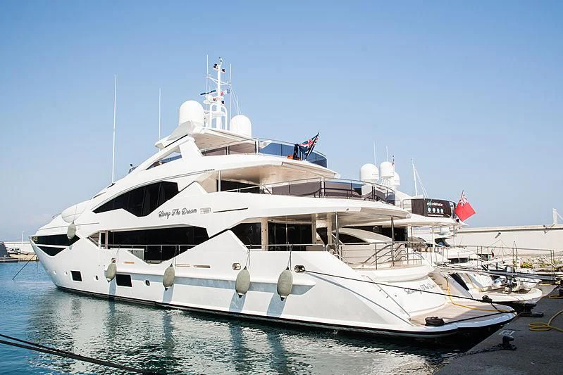 a large white boat aboard LIVING THE DREAM Yacht for Sale