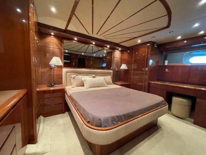 a bed in a room aboard ESTIA POSEIDON Yacht for Charter