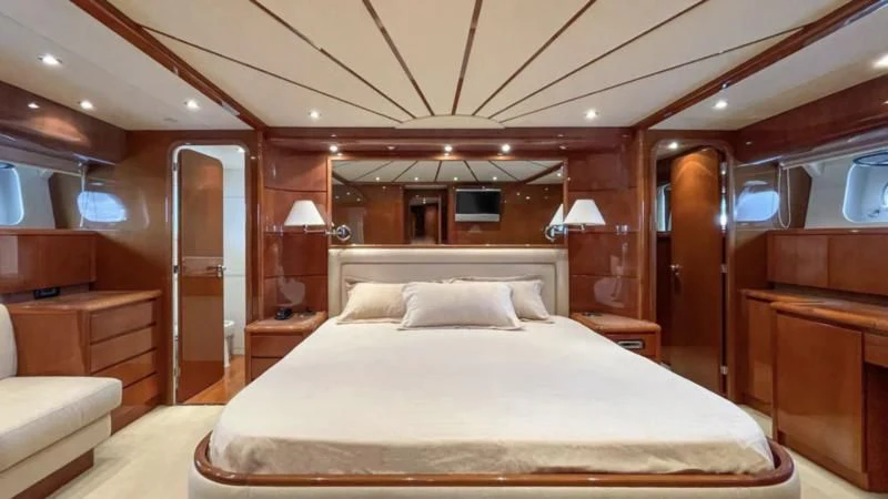 a bed in a room aboard ESTIA POSEIDON Yacht for Charter