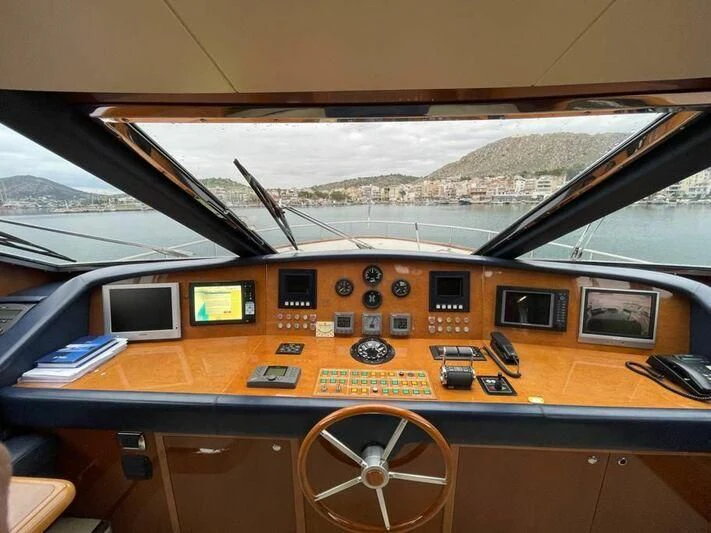 inside of a vehicle with a view of a city and water aboard ESTIA POSEIDON Yacht for Charter
