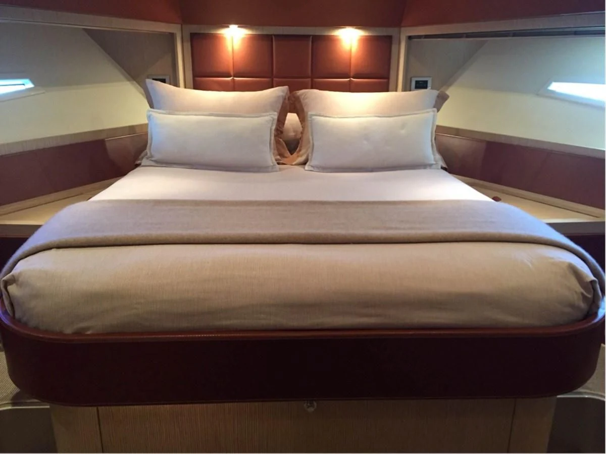 a bed with pillows aboard UNNAMED Yacht for Sale