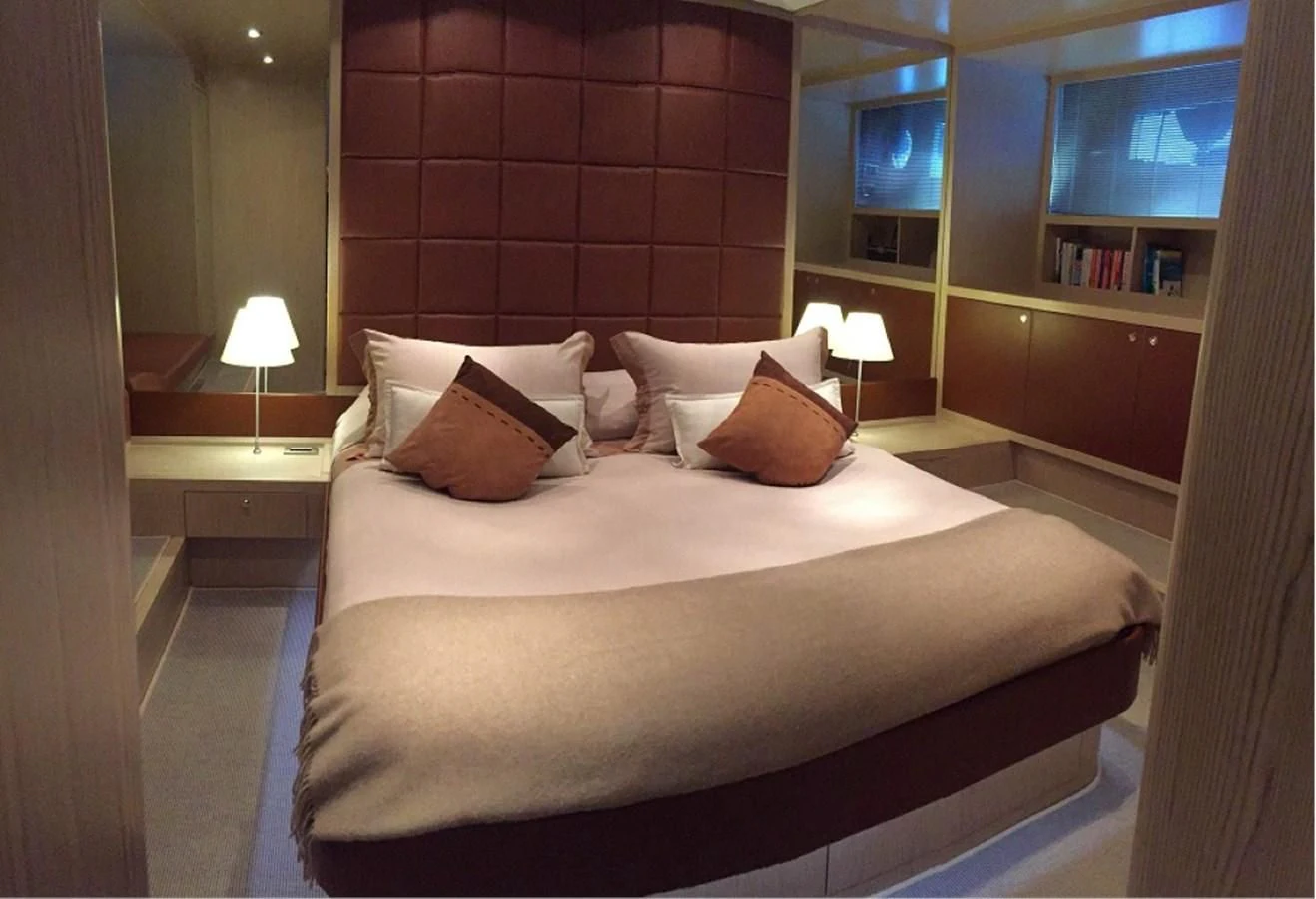 a bed with pillows and pillows aboard UNNAMED Yacht for Sale