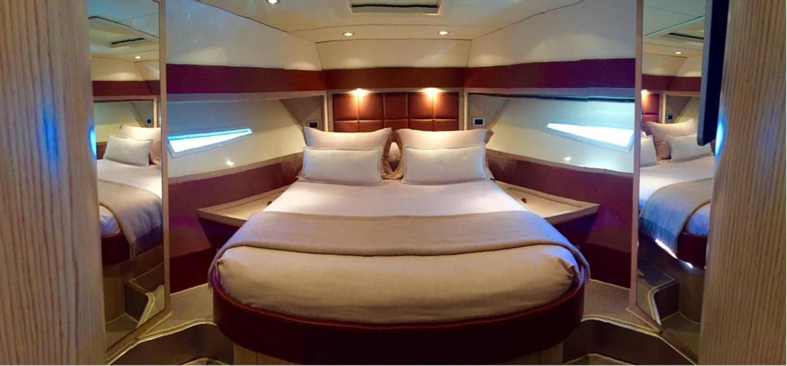 a room with a bed and a window aboard UNNAMED Yacht for Sale