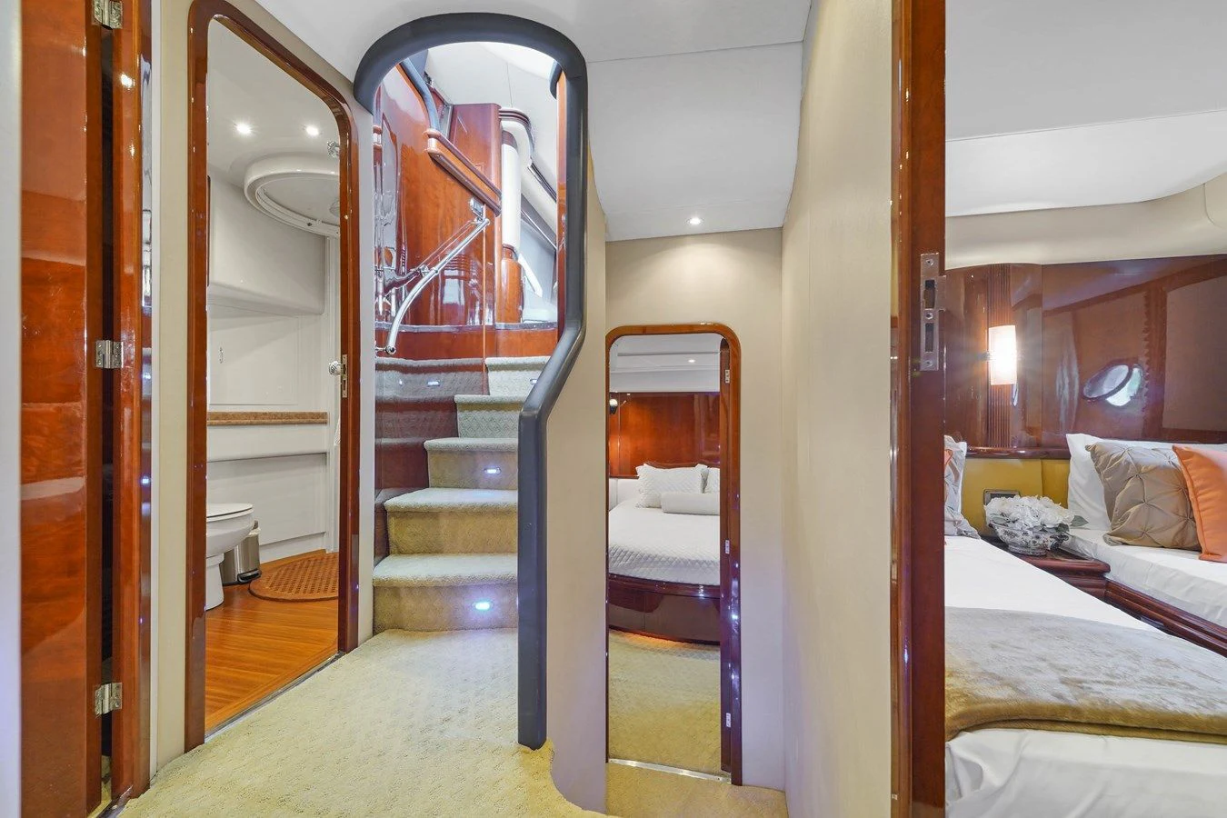 a room with a bed and a mirror aboard AZIMUT 80 2003 Yacht for Sale