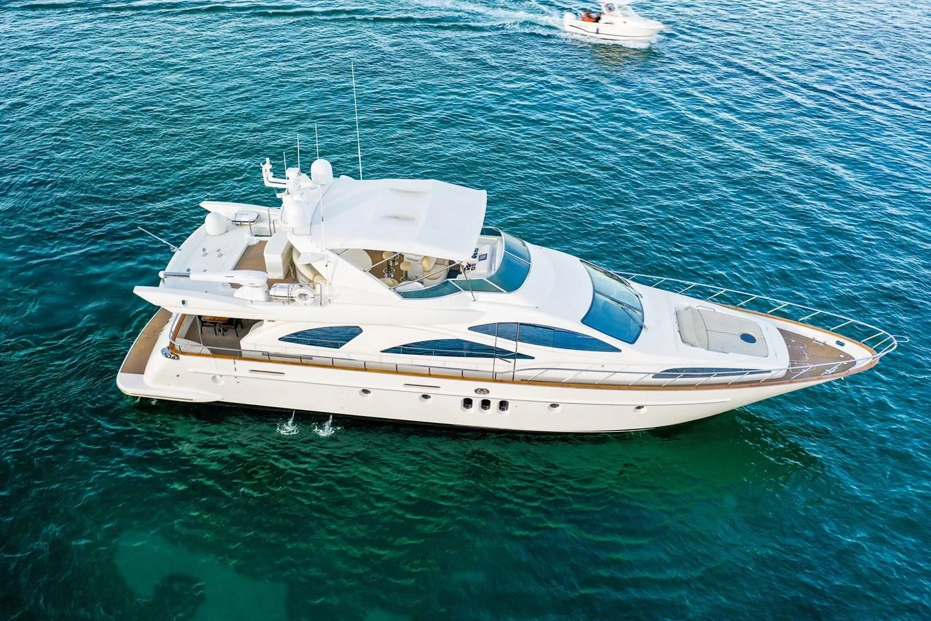 a white boat in the water aboard AZIMUT 80 2003 Yacht for Sale