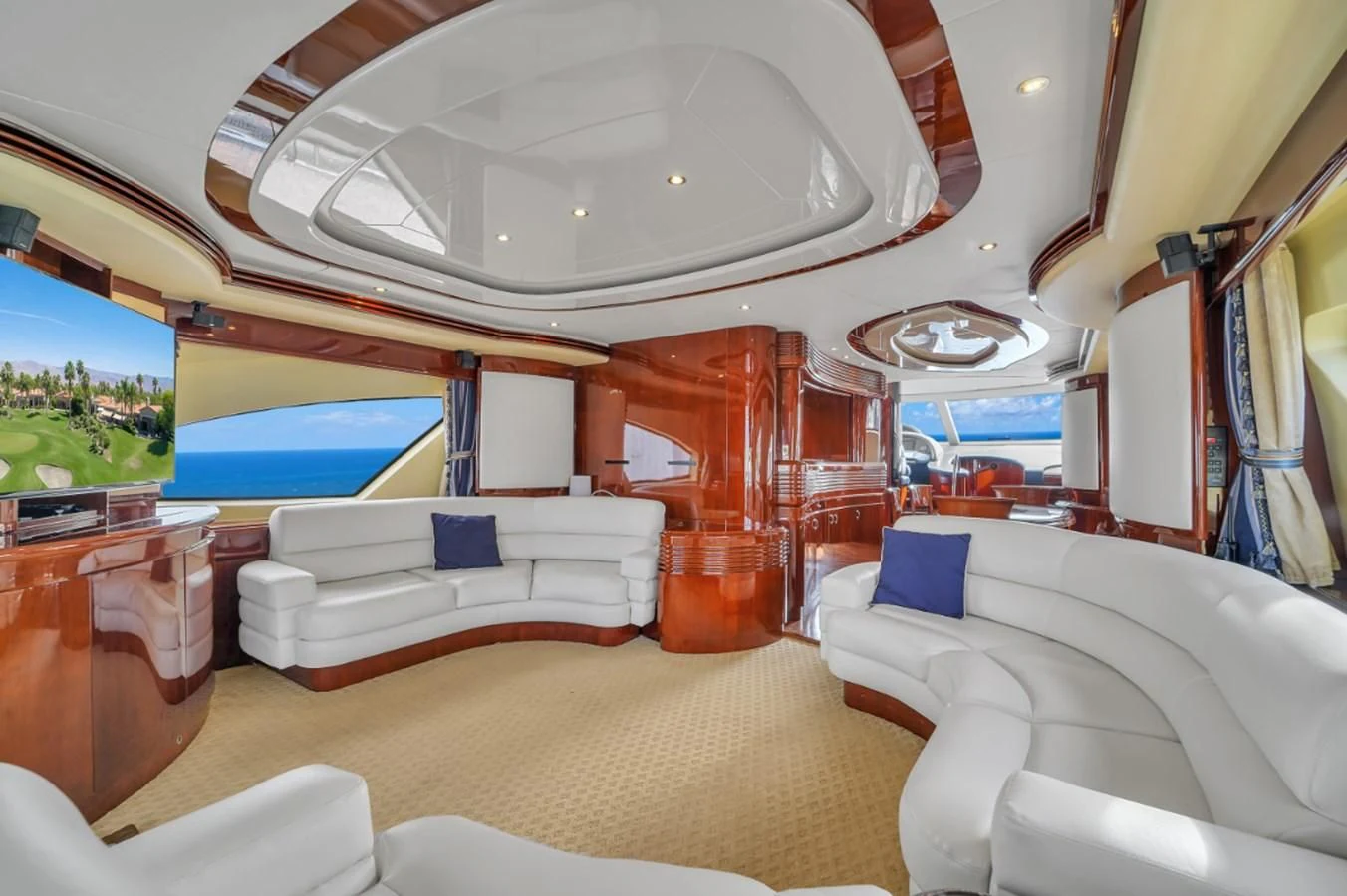 a room with a couch and a television aboard AZIMUT 80 2003 Yacht for Sale