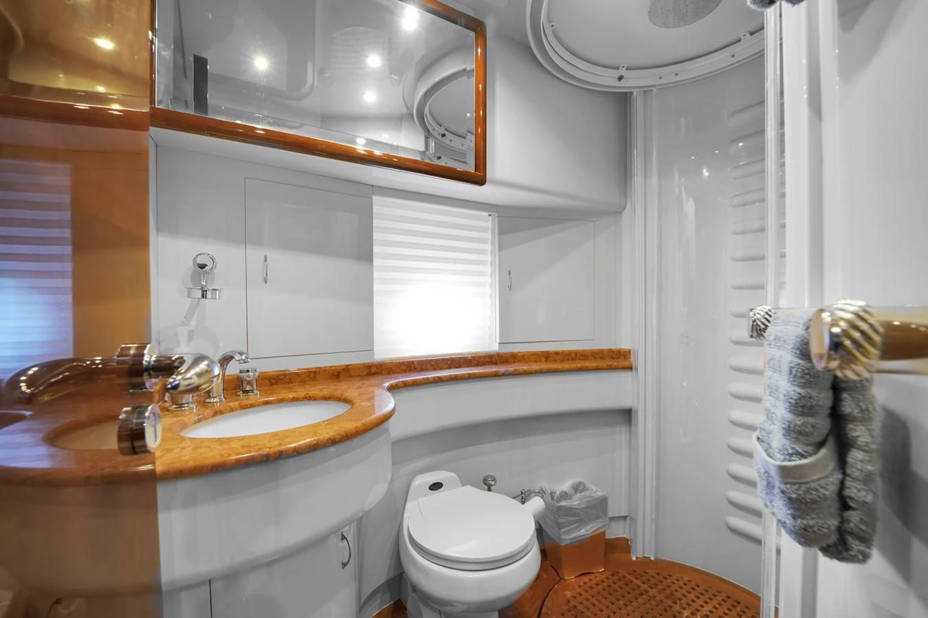 a bathroom with a sink and toilet aboard AZIMUT 80 2003 Yacht for Sale