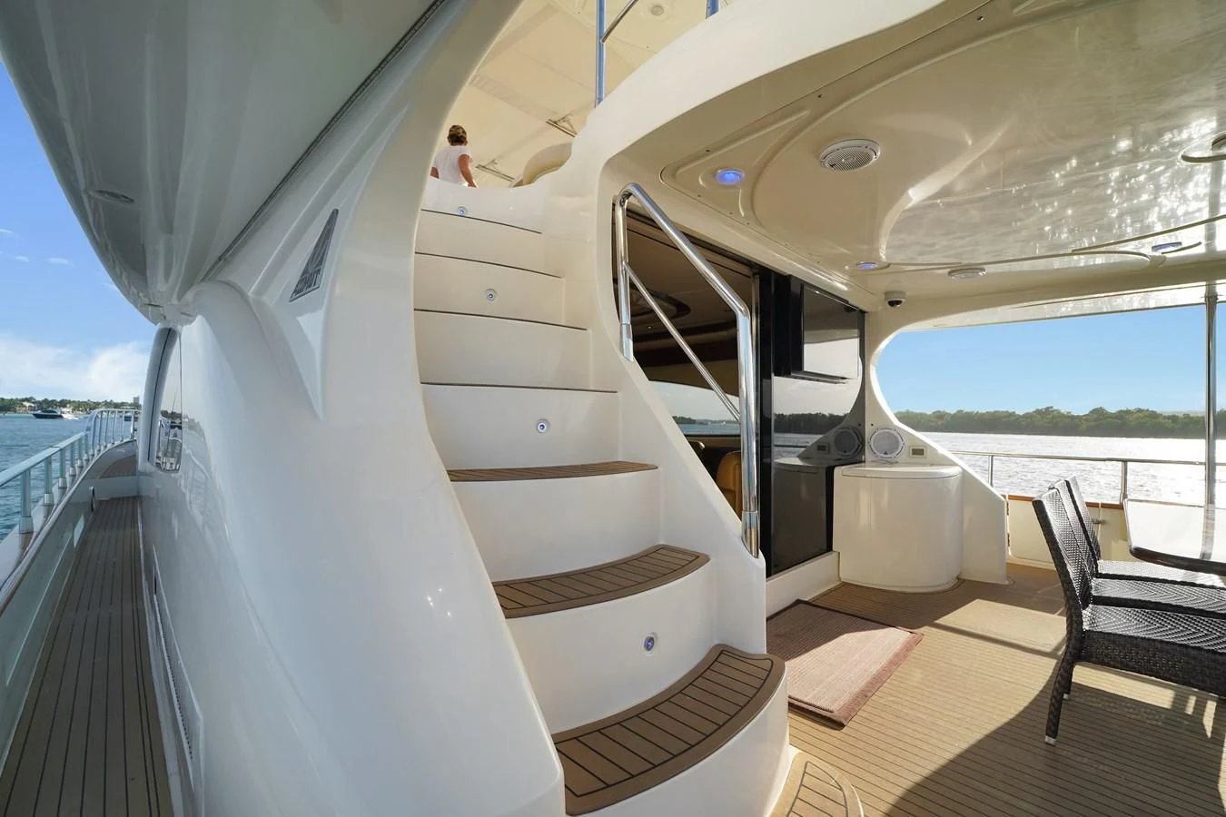 a boat with a person sitting on the deck aboard AZIMUT 80 2003 Yacht for Sale
