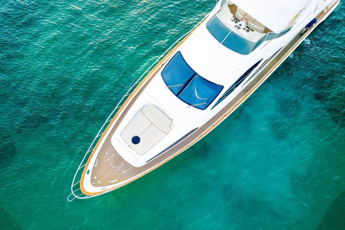 a white and black boat in the water aboard AZIMUT 80 2003 Yacht for Sale