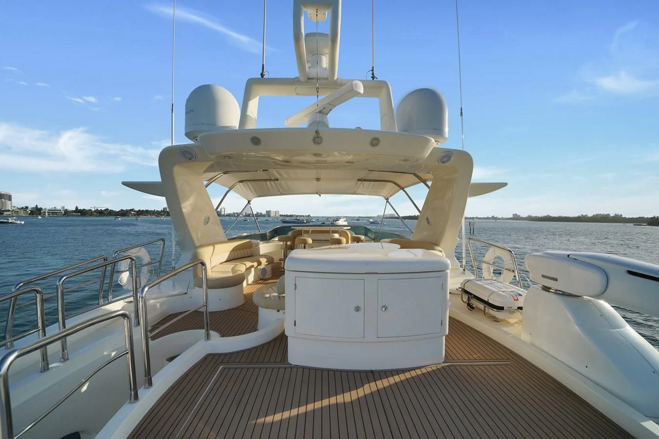 a large white boat on a body of water aboard AZIMUT 80 2003 Yacht for Sale