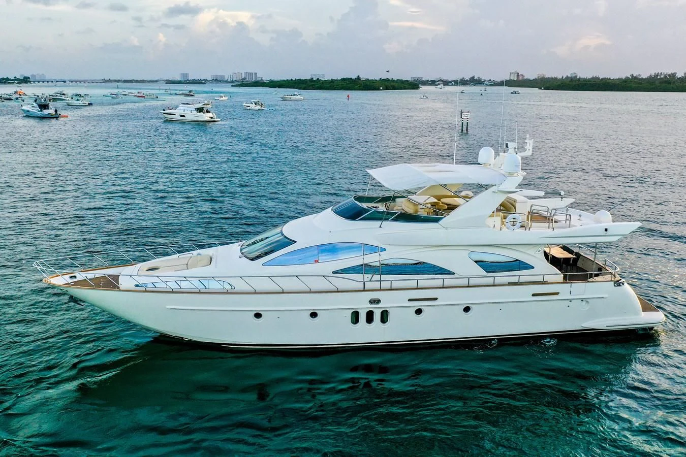 a white boat in the water aboard AZIMUT 80 2003 Yacht for Sale
