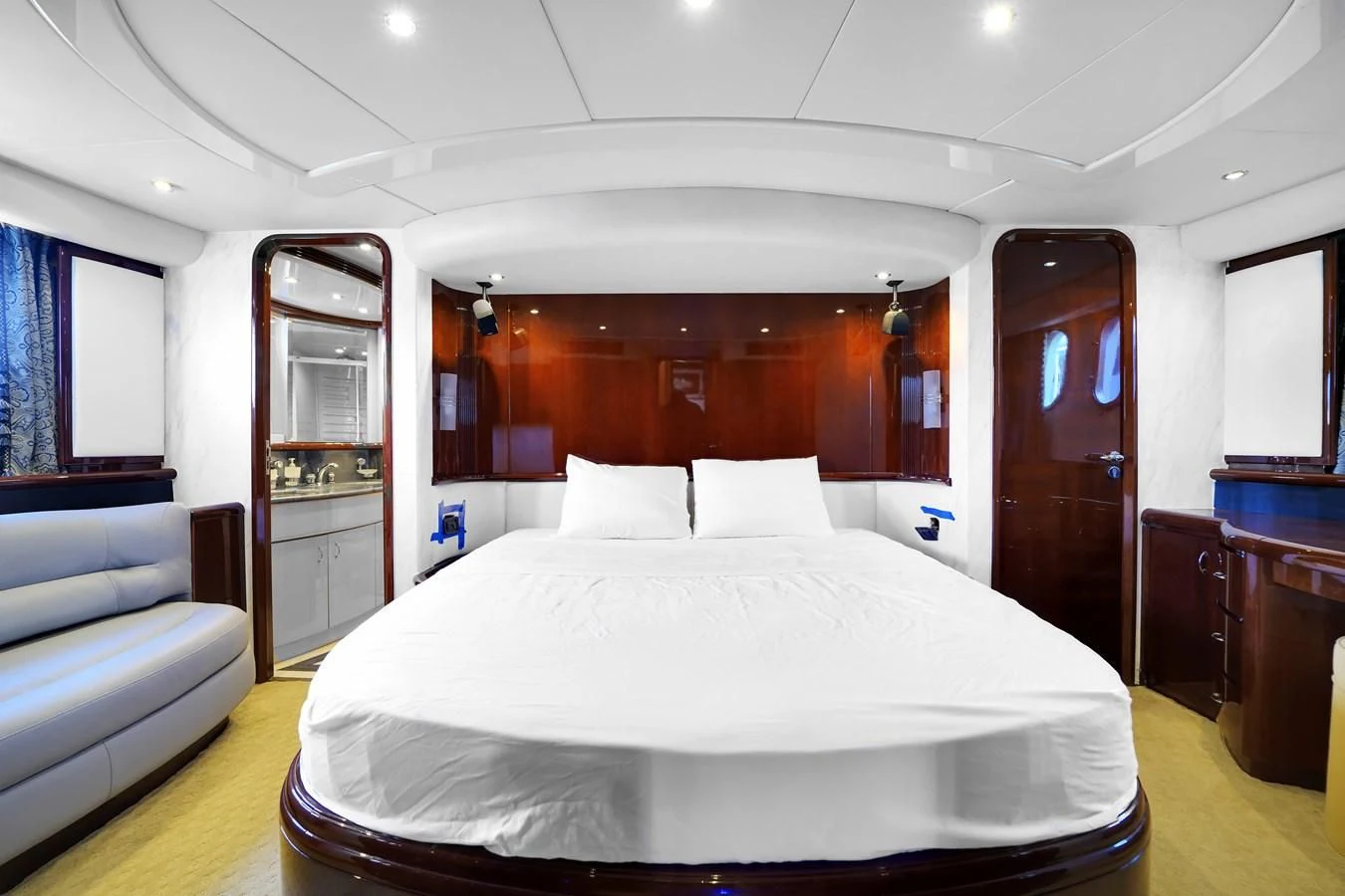 a large bed in a room aboard AZIMUT 80 2003 Yacht for Sale