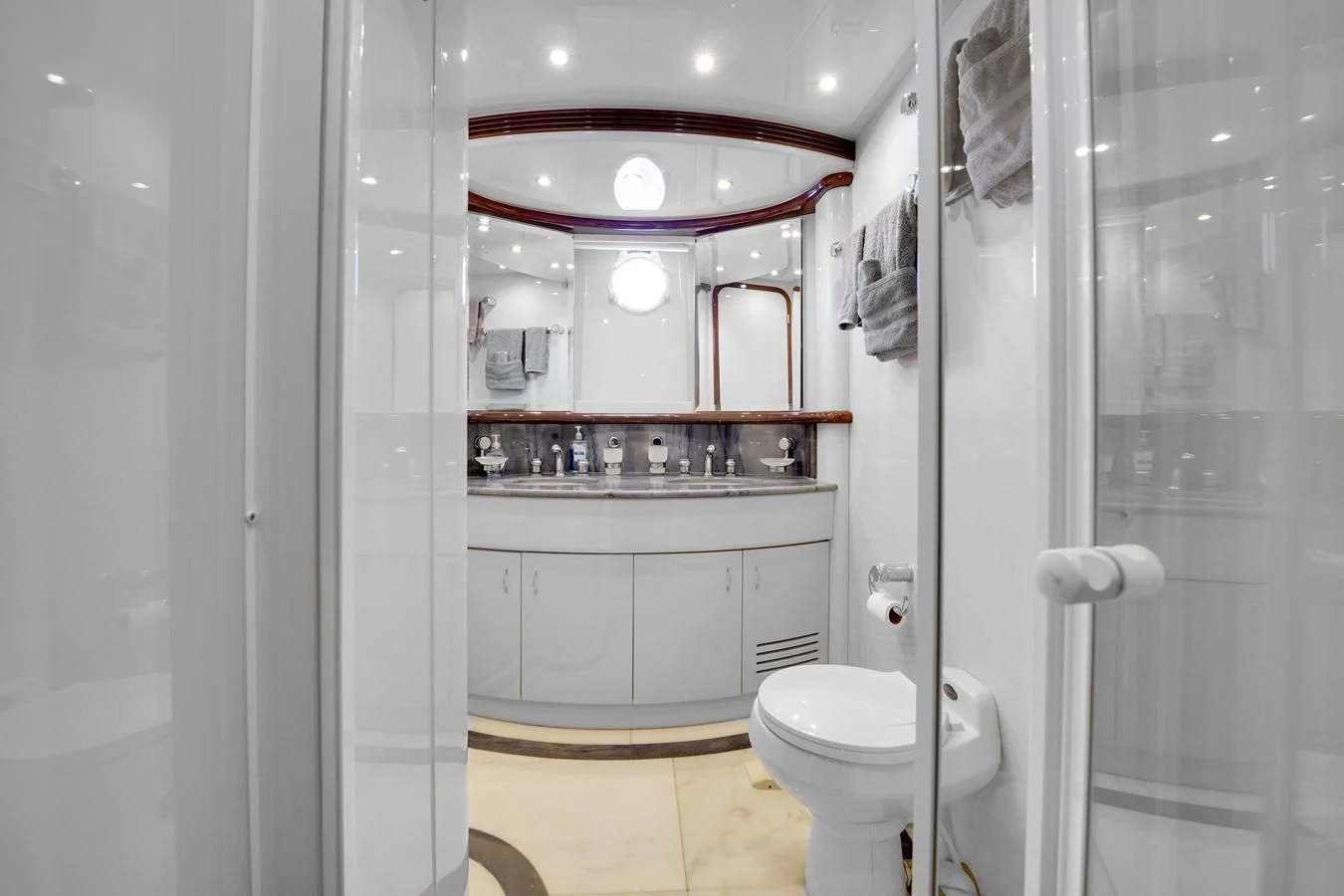 a bathroom with a toilet and a shower aboard AZIMUT 80 2003 Yacht for Sale