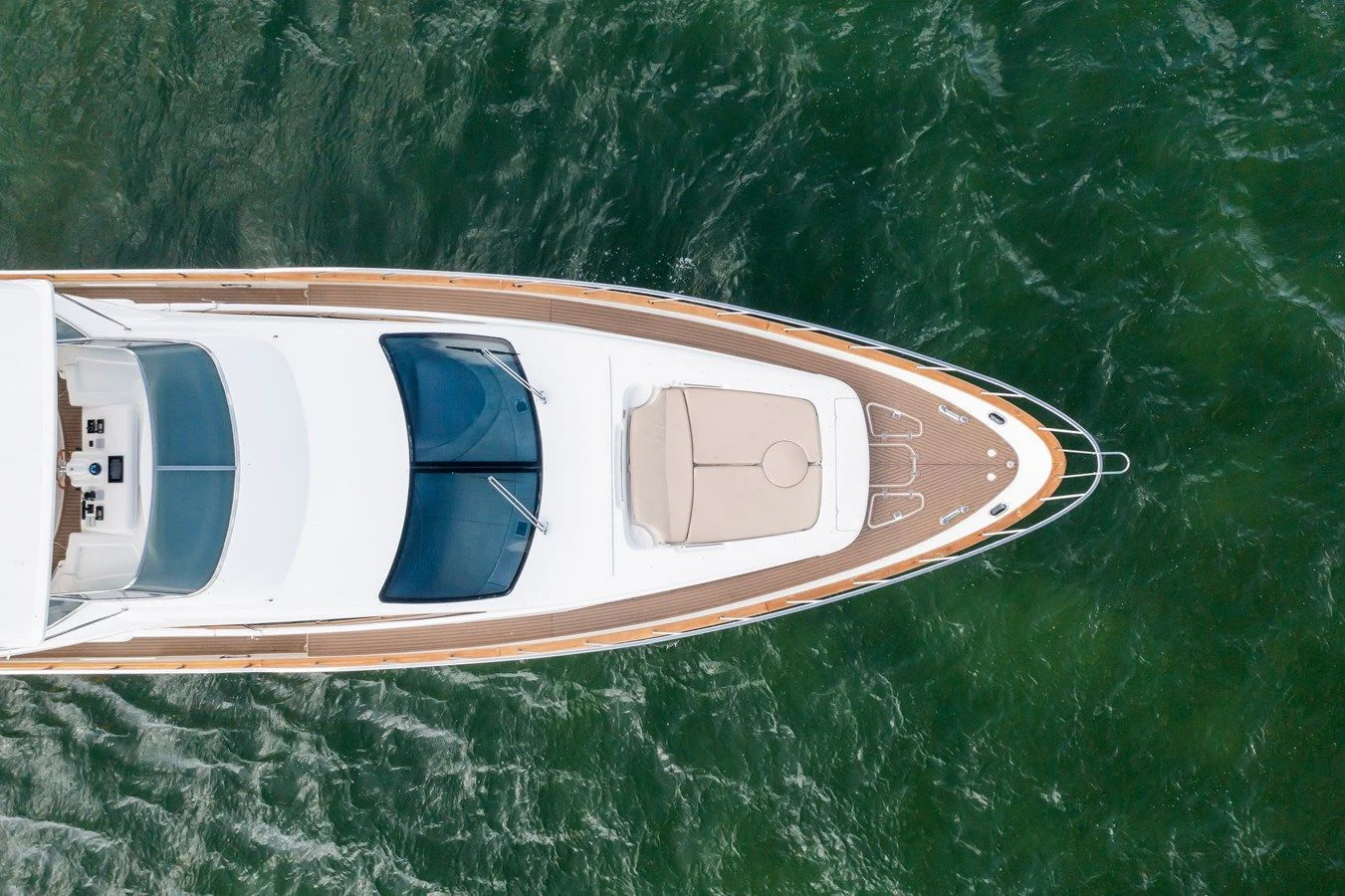 a small white boat aboard AZIMUT 80 2003 Yacht for Sale