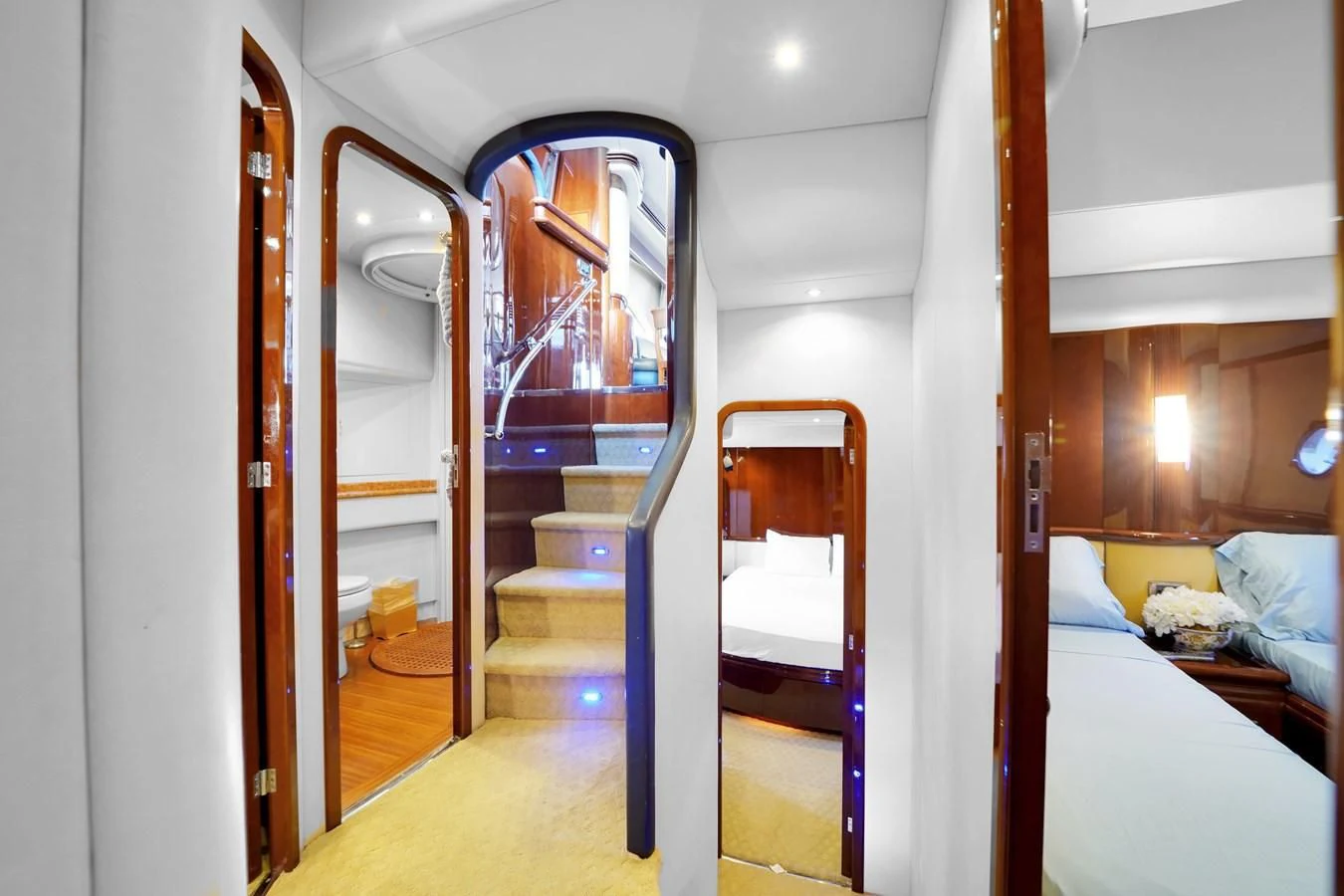 a room with a bed and a mirror aboard AZIMUT 80 2003 Yacht for Sale