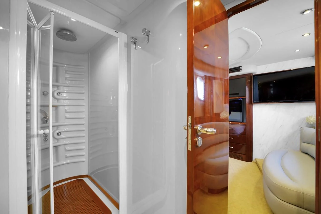 a room with a glass door aboard AZIMUT 80 2003 Yacht for Sale