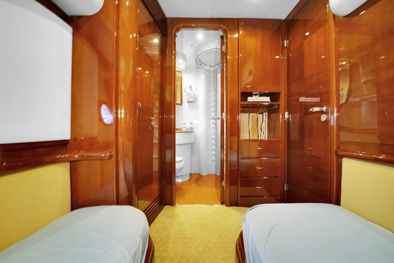 a room with a bed and a closet aboard AZIMUT 80 2003 Yacht for Sale