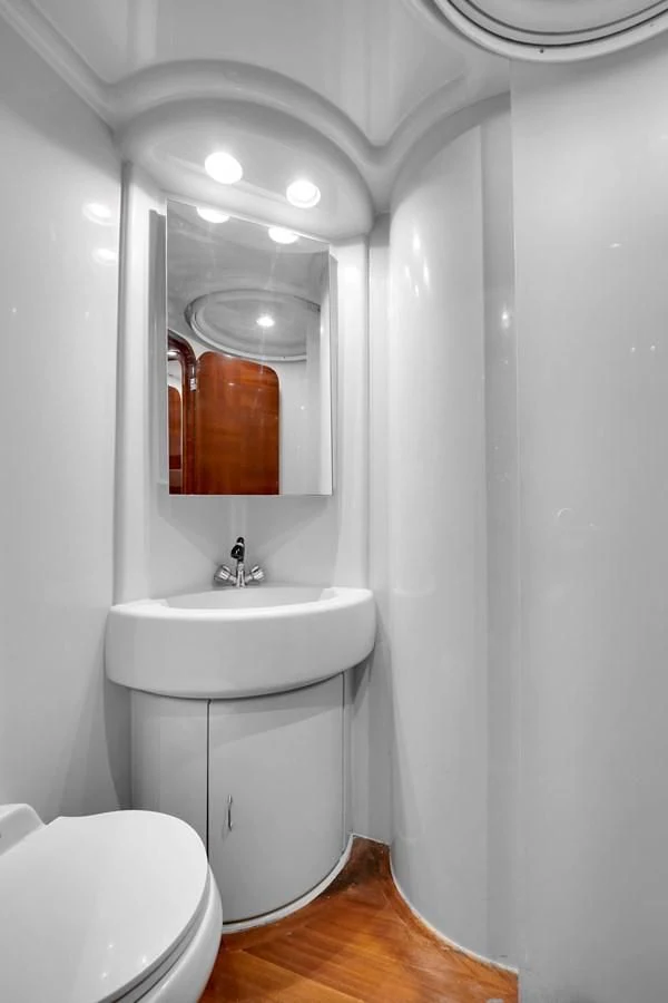 a bathroom with a sink and toilet aboard AZIMUT 80 2003 Yacht for Sale