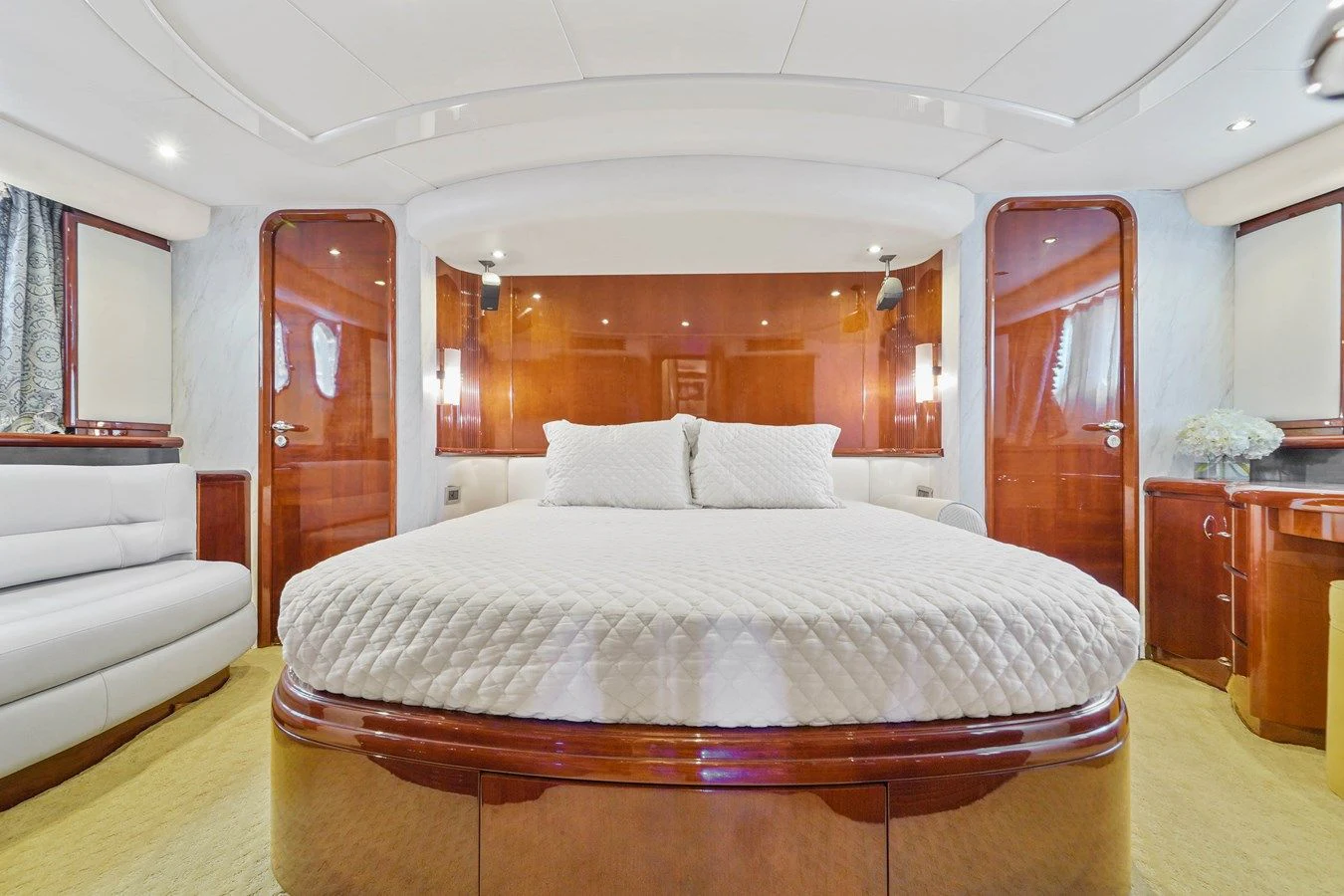 a large bed in a room aboard AZIMUT 80 2003 Yacht for Sale