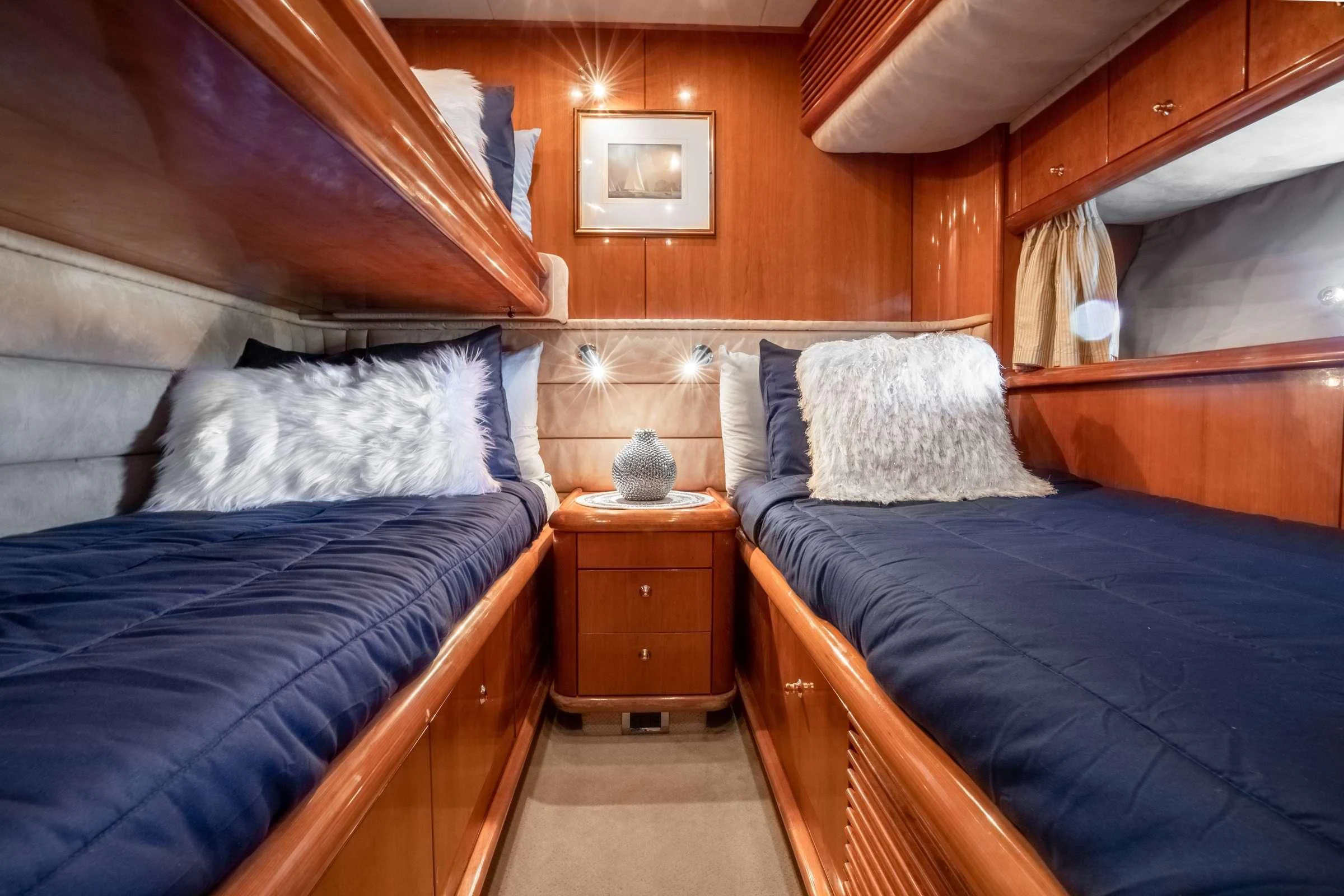 a room with two beds aboard LEOLENA Yacht for Sale