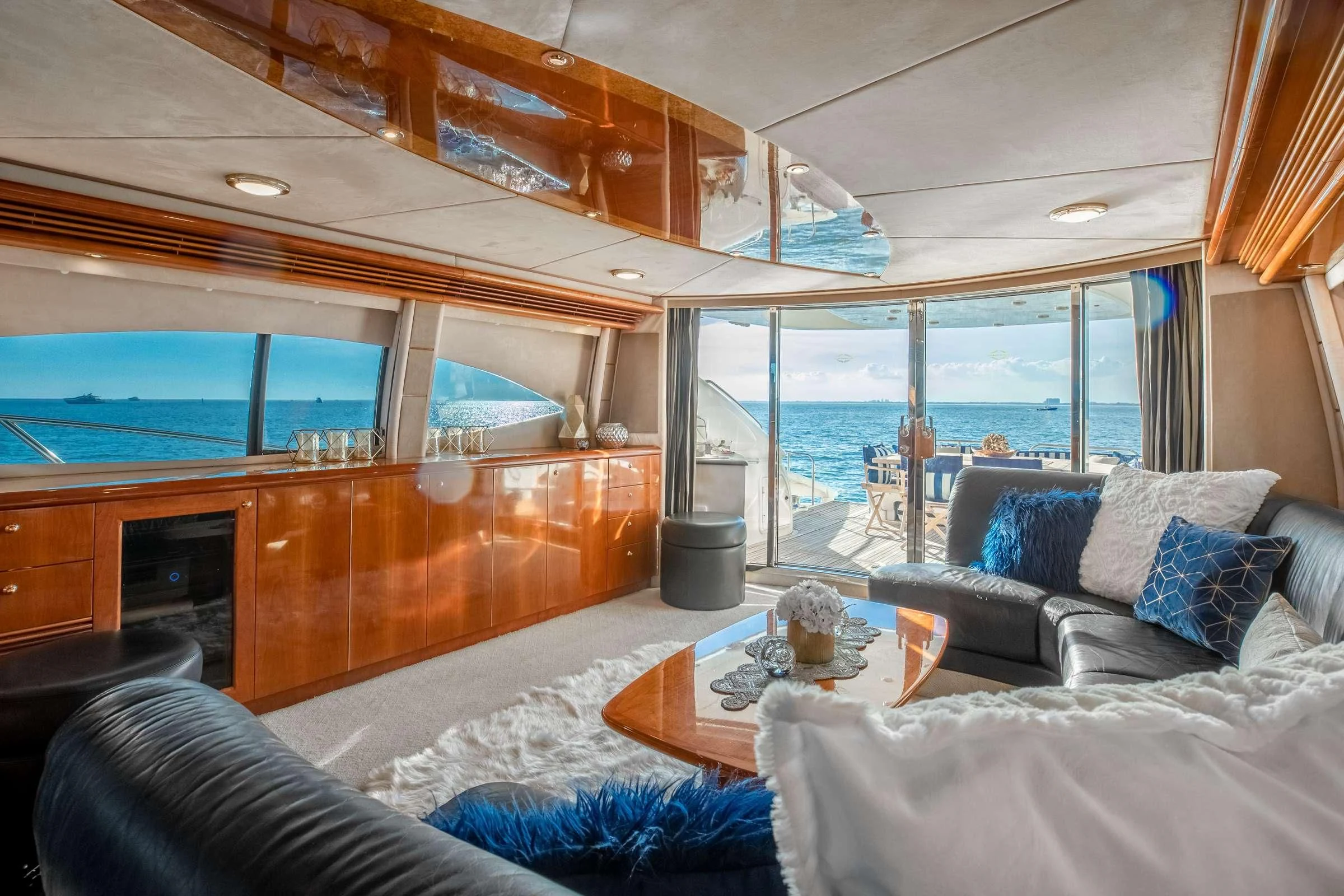 a living room with a large window aboard LEOLENA Yacht for Sale