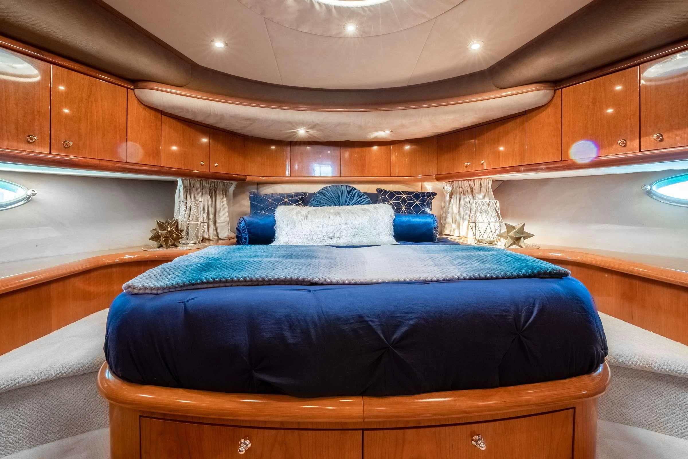 a bed in a room aboard LEOLENA Yacht for Sale