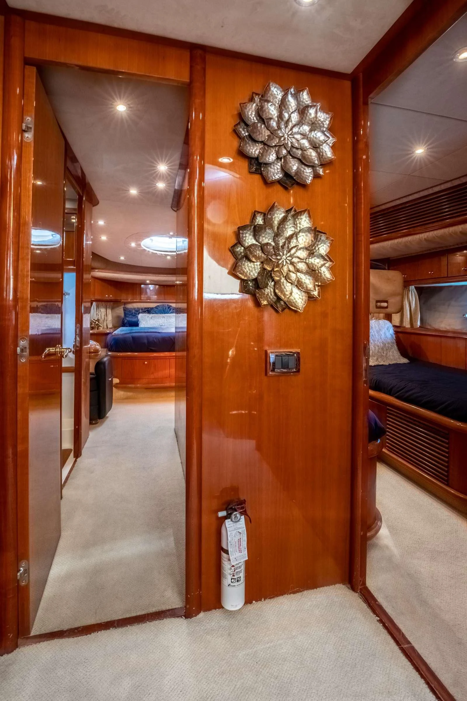 a wood door with a chandelier on it aboard LEOLENA Yacht for Sale