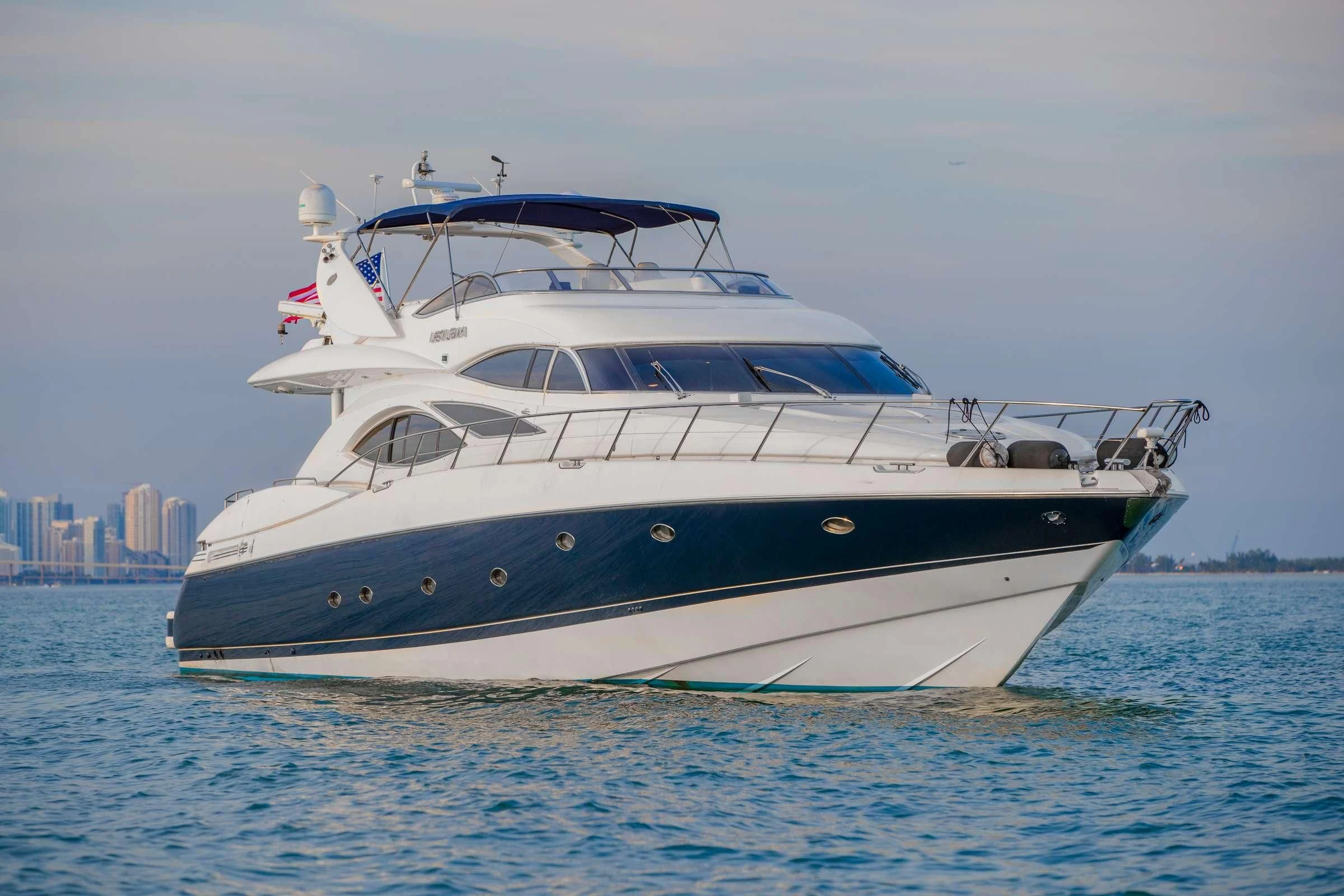 a white yacht in the water aboard LEOLENA Yacht for Sale