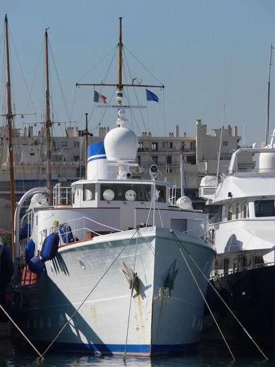 a boat docked in a harbor aboard CALISTO Yacht for Sale