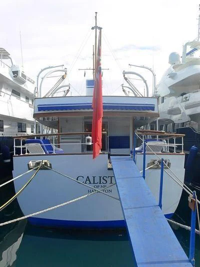 a boat with a red pole aboard CALISTO Yacht for Sale