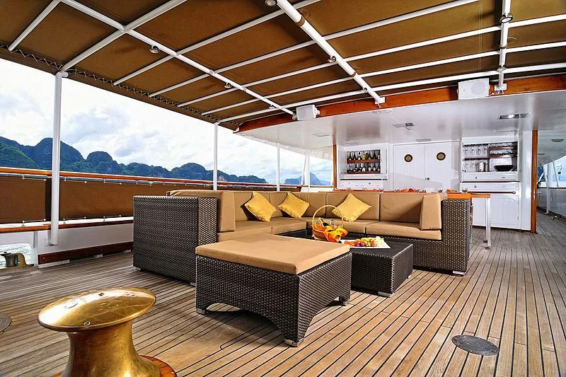 a living room with a large window aboard CALISTO Yacht for Sale