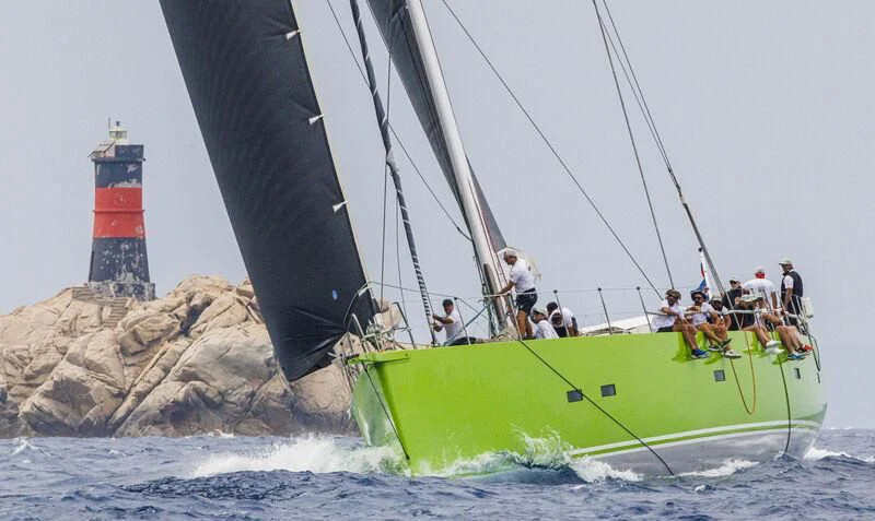a sailboat with people on it aboard INOUI Yacht for Sale
