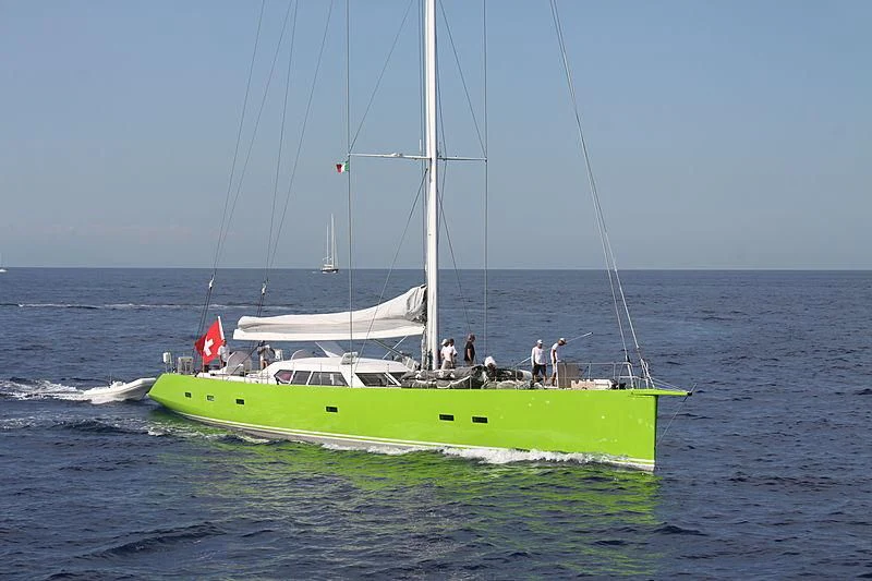 a sailboat with people on it aboard INOUI Yacht for Sale