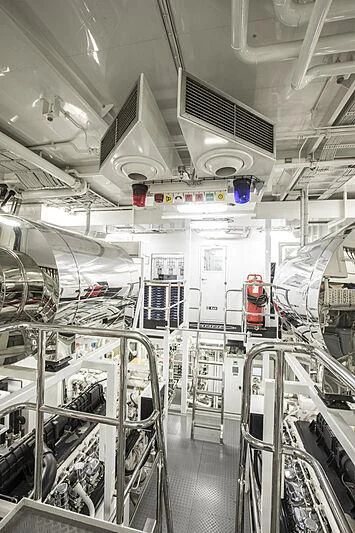 a room with several machines aboard FIREBIRD Yacht for Charter
