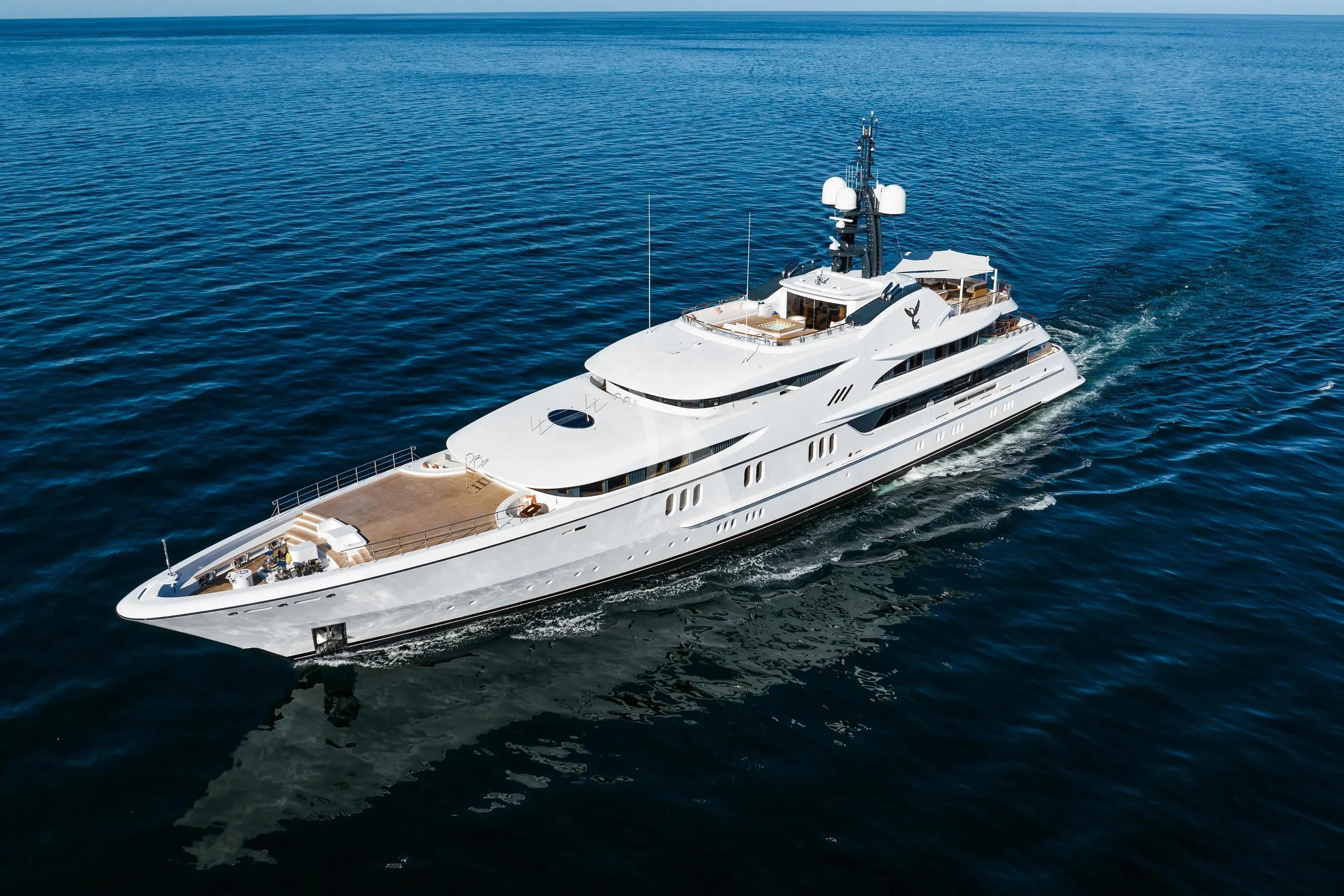 a white boat in the water aboard FIREBIRD Yacht for Charter