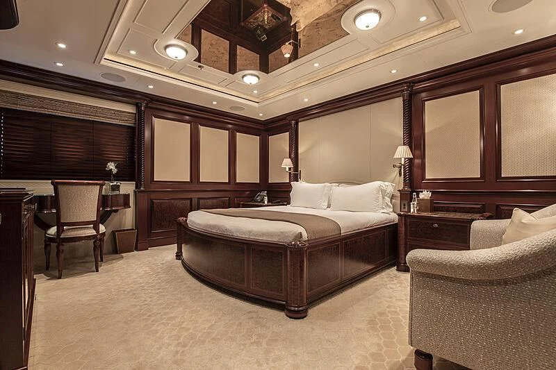 a large bedroom with a large bed aboard FIREBIRD Yacht for Charter