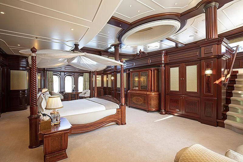 a large bedroom with a large bed aboard FIREBIRD Yacht for Charter