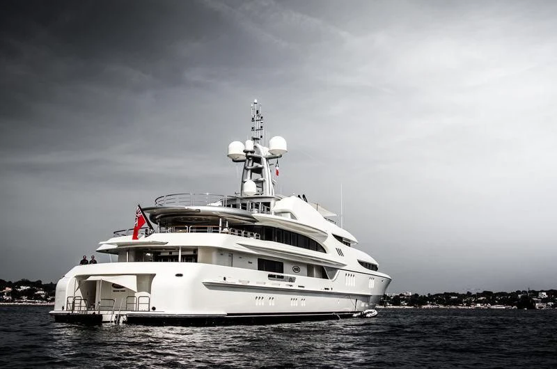 a large white boat in the water aboard FIREBIRD Yacht for Charter