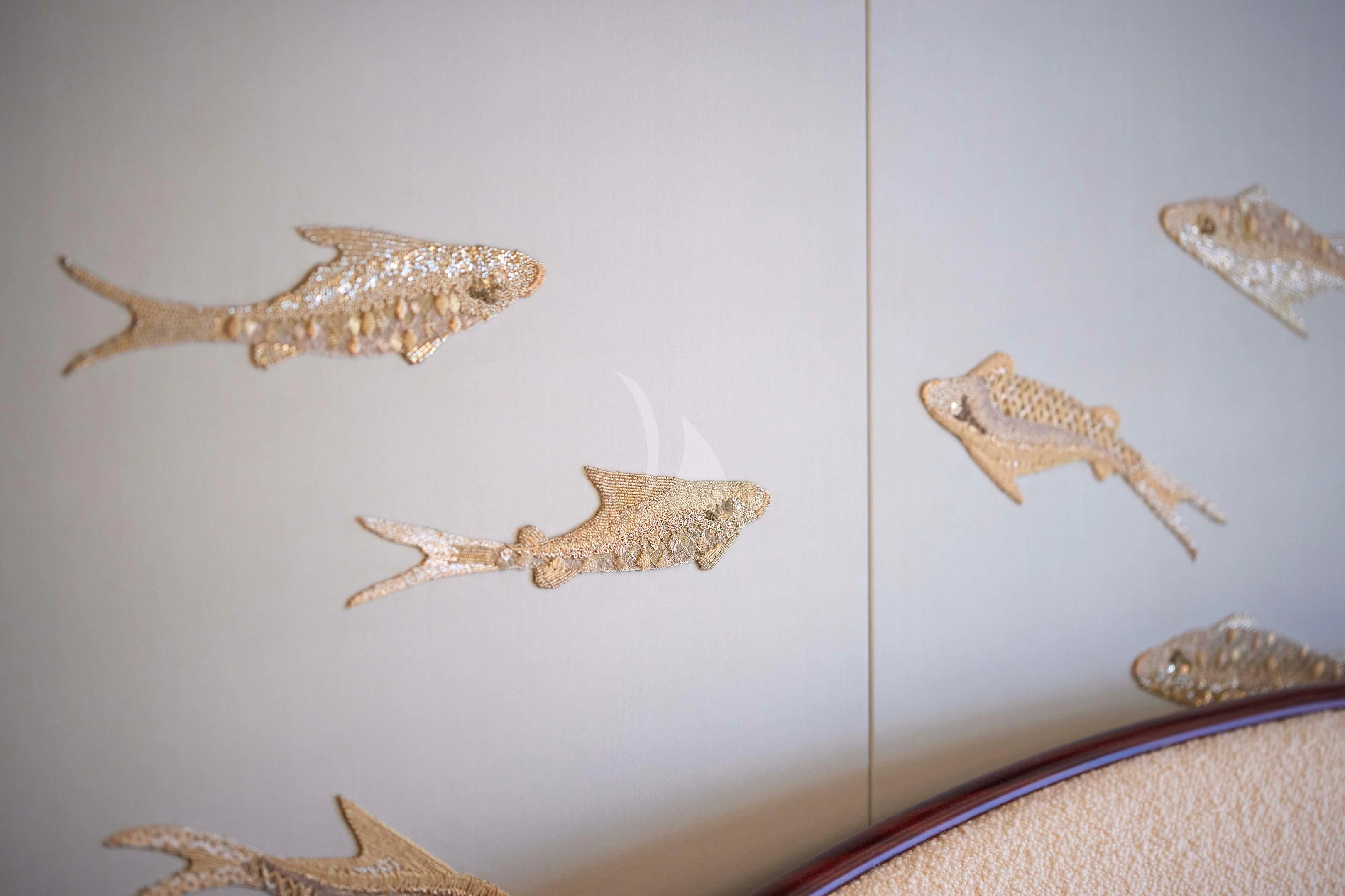 a group of lizards on a wall aboard FIREBIRD Yacht for Charter