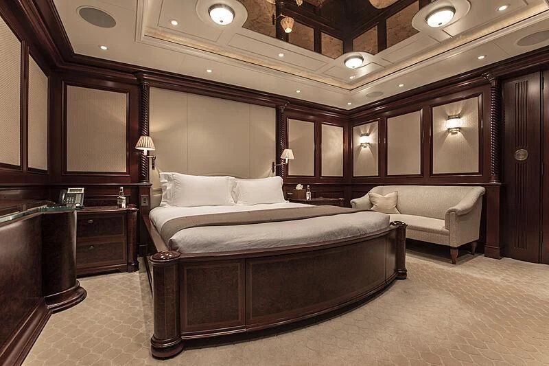 a large bedroom with a large bed aboard FIREBIRD Yacht for Charter