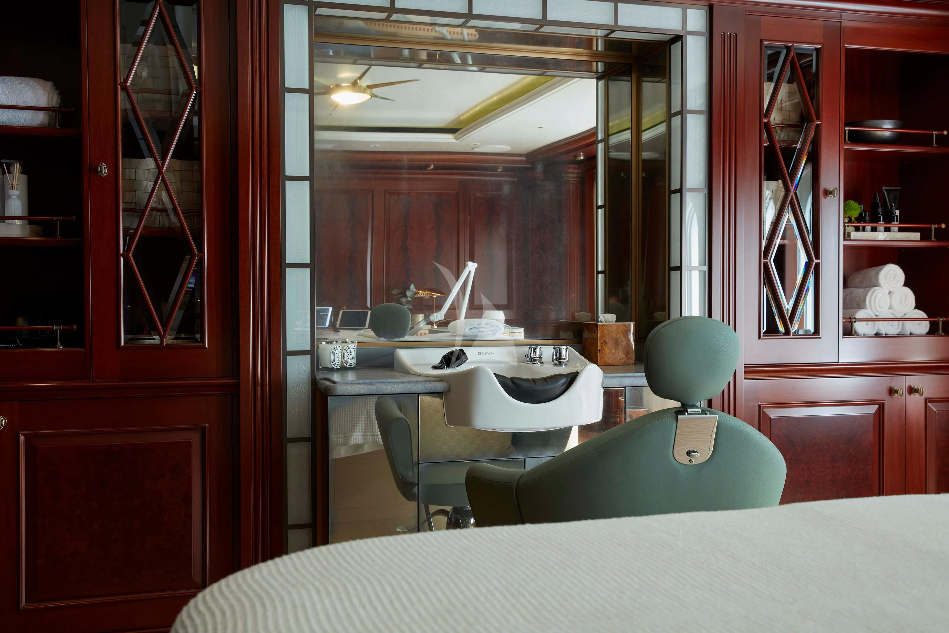 a kitchen with a table and chairs aboard FIREBIRD Yacht for Charter