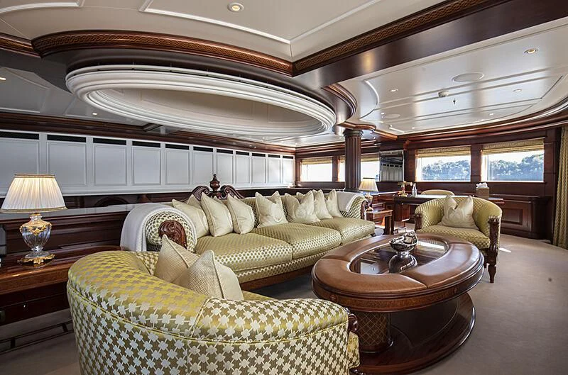 a living room with a large ceiling aboard FIREBIRD Yacht for Charter