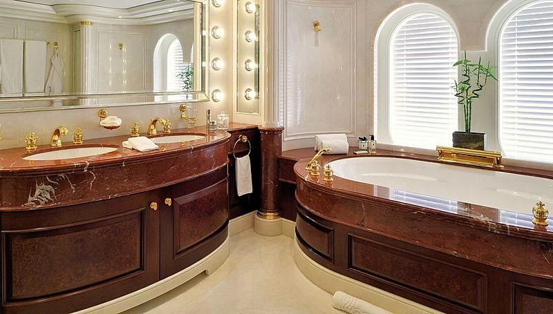 a bathroom with a large tub aboard FIREBIRD Yacht for Charter
