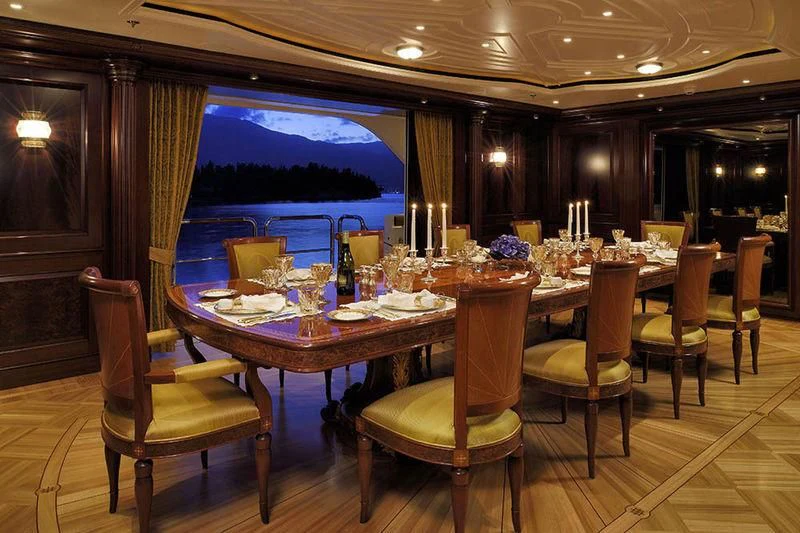 a table set for a dinner aboard FIREBIRD Yacht for Charter