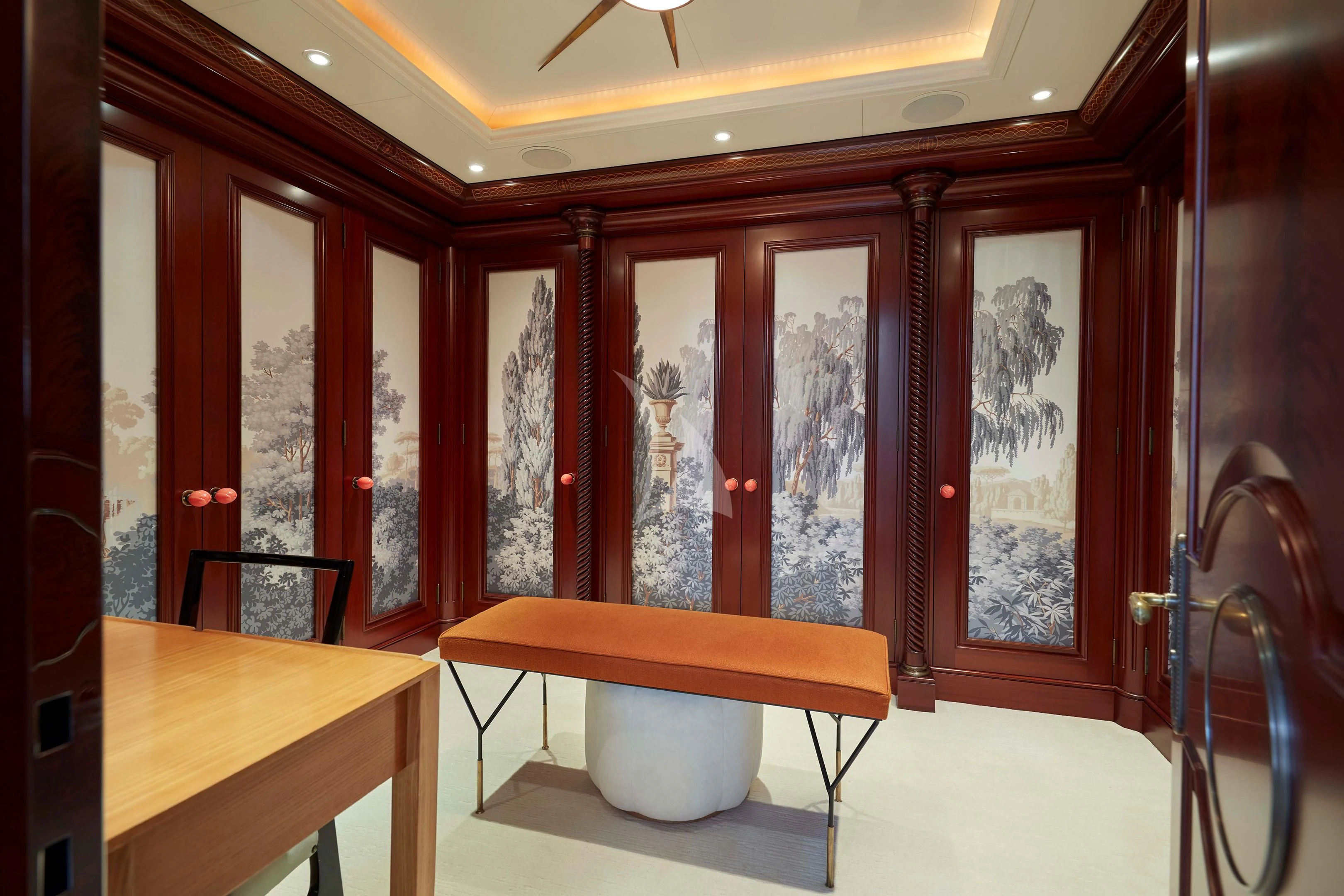 a room with a table and chairs aboard FIREBIRD Yacht for Charter