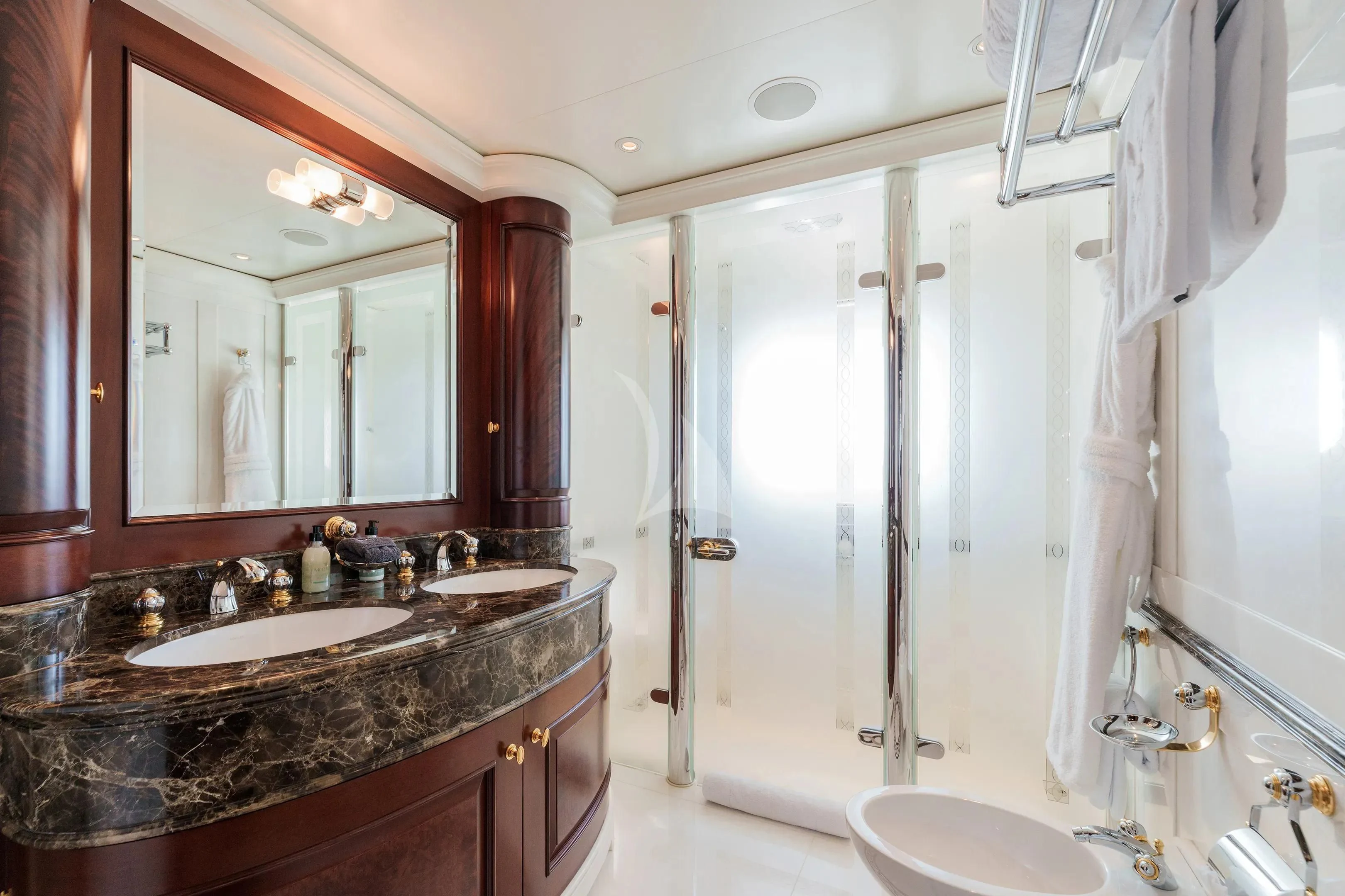 a bathroom with a marble countertop aboard FIREBIRD Yacht for Charter